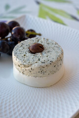 Cheese collection, French soft white goat cheese with herbs of Provence and olives