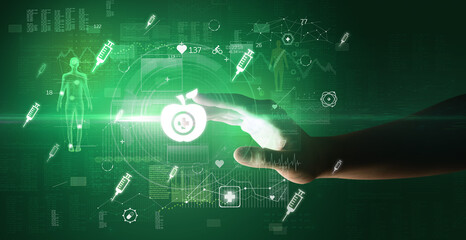Doctor hand pressing futuristic health device with medical symbol on screen
