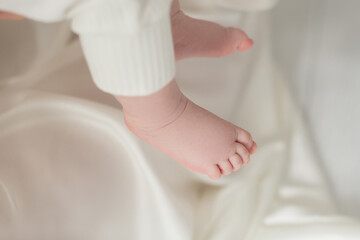 Tiny newborn baby feet