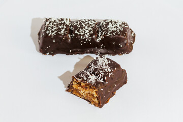 Close-up Vegan, chocolate cutaway candies on white background. Homemade bakery. Delicious and sweet.