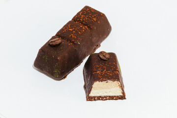 Close-up Vegan, chocolate cutaway candies on white background. Homemade bakery. Delicious and sweet.