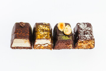 Close-up Vegan, chocolate cutaway candies on white background. Homemade bakery. Delicious and sweet.