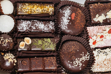 closeup various handmade vegan chocolate candies 