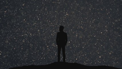The human silhouette standing on a starry sky background