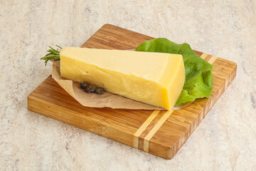 Traditional delicous Parmesan cheese over borad