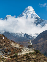 little buddha stupa with view to peak Ama Dablam in Nepal © sergejson