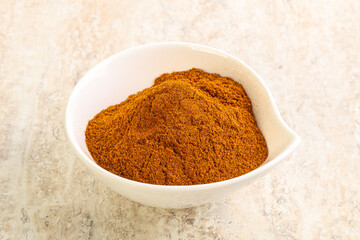 Dry Paprika powder in the bowl