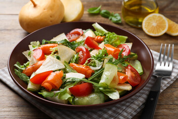 Delicious turnip salad served on wooden table, closeup