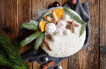 Christmas naked gingerbread cake with whipped cream and coconut filling