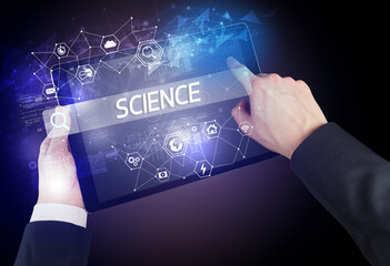 Close-up of a tablet searching inscription