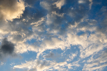 Scattered clouds in the blue sky, sunset in rural area of Guatemala