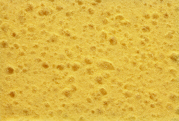 Texture or background of yellow synthetic sponge.
