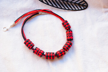 Geometric red black necklace of polymer clay.