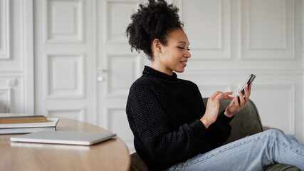 The designer works on the Internet online. A female blogger is playing the app. Student training on the college website. Workplace freelancer remote activity.