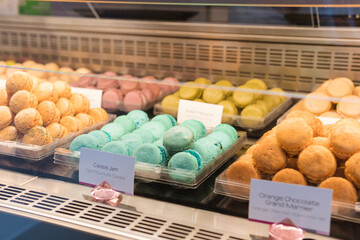 Colorful and delicious macarons for sale in pastry shop