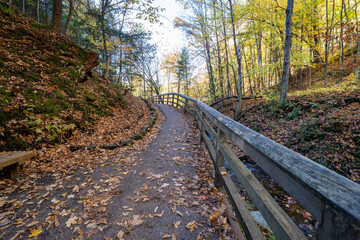 Hiking trail to Munising Falls waterfall in Pictured Rocks National Lakeshore during fall season