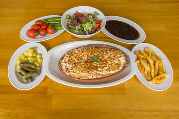 fried cheese and salad on plate