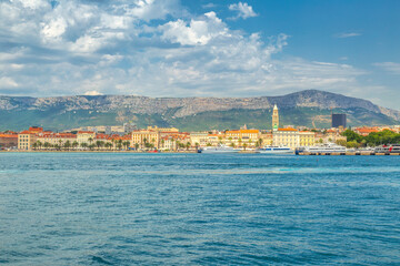 View from the sea on the historic center of Split with mountains in the background, Croatia, Europe.