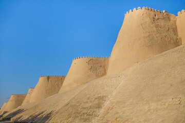 Outer walls of Ichan-Kala, inner city of Khiva (Uzbekistan), its historical center. Height of walls, excluding base, reaches 10 meters, thickness is up to 8 m