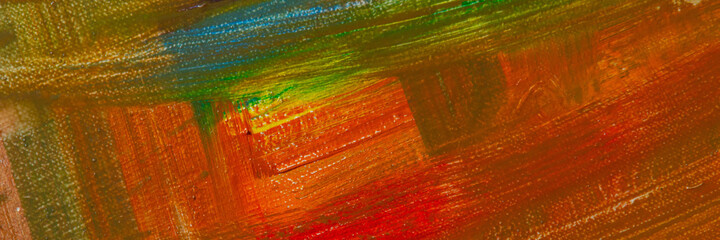 abstract rainbow multicolored background formed by erasing paints from the canvas, short focus. Not an art object, temporary effect.