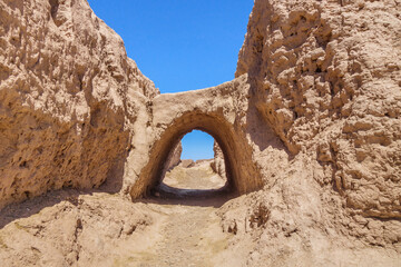 Passage inside the walls of the ancient desert fortress Ayaz-Kala. The fortification was built in the 3-4th century BC. Shot in the Kyzylkum desert, Karakalpakstan (Uzbekistan)