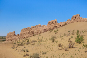 Janbas-Kala fortress, gradually covered with desert sands and overgrown with saxaul. Fortification was founded in the 4th century BC. Shot in the Kyzylkum Desert, Karakalpakstan, Uzbekistan