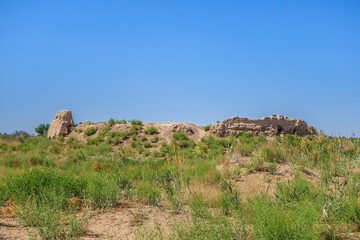 Fototapeta na wymiar Panorama of Koi-Krylgan-Kala temple complex (400 BC), Karakalpakstan, Uzbekistan. There was Zoroastrian temple and royal tomb. 2-storey structure surrounded by circle of walls with diameter of 44 m