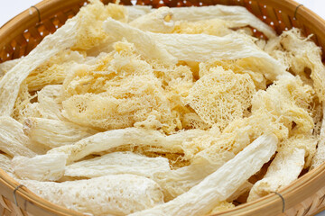 Dried tropical stinkhorn mushroom in bamboo basket