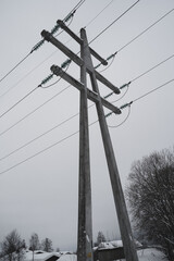 power pylons in snow sky