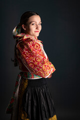 Young beautiful slovak woman in traditional dress. Slovak folklore