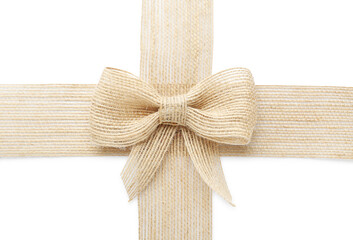 Burlap ribbons with pretty bow on white background, top view