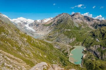 Naklejka na ściany i meble Reservoir of Mount Grossglockner glacial water in the High Tauern National Park