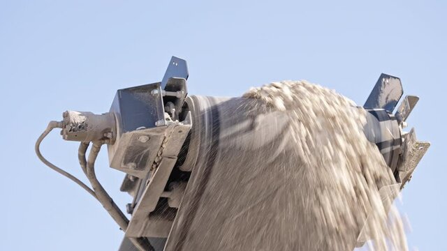 Mobile portable crushing screening plant. Mining conveyor belt sorts rock and loading stones in truck. Heavy machinery working for minerals extraction. Mining extractive industry.