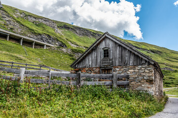Fototapeta na wymiar An old traditional Alpine house at the Grossglockner Mountain