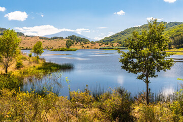 View of Biviere lake with Etna volcano, Nebrodi National Park, Sicily, Italy
