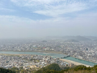 Fototapeta na wymiar Panoramic View of Gifu from Mt. Kinka/Gifu Castle in Japan