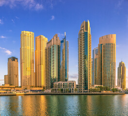 Fototapeta na wymiar Day view of Dubai Marina bay with clear sky, UAE