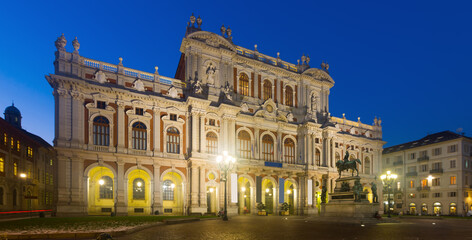 Fototapeta premium Night view of rear facade of Palazzo Carignano in Piazza Carlo Alberto in Turin, Italy