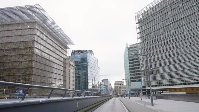 Almost no one in the European quarter due to the coronavirus in Brussels, Belgium. Skyline with the European Commission on the right, Europa building on the left