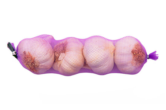 Four heads of garlic isolated on the white background