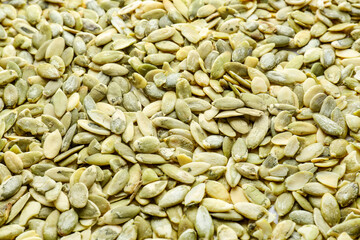 Natural pumpkin seeds as background