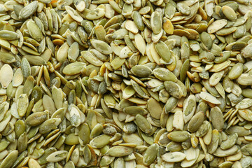 Natural pumpkin seeds as background