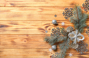 Beautiful snowflakes, Christmas decor and fir branches on wooden background