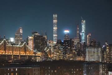 Naklejka premium urban city skyline at night with skyscrapers