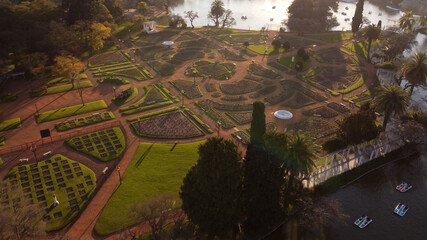 Aerial shot of beautiful Palermo Rosedal Garden Park beside Lake in Buenos Aires