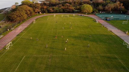 Women playing football match. Aerial shot