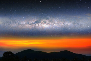 Fototapeta na wymiar Milky way night landscape sunset light on silhouette mountain