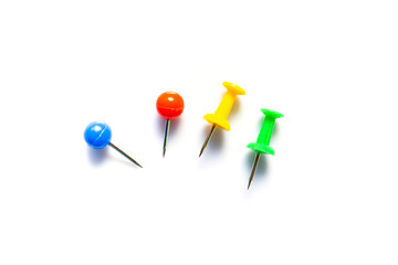 Group of colorful pins  on white background  with copy space
