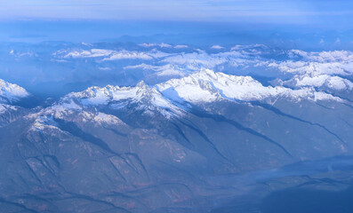 Fototapeta na wymiar Winter in Rocky Mountains from far above