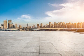Obraz premium Panoramic skyline and modern commercial office buildings with empty road. empty square floors and cityscape.